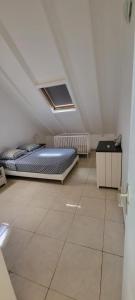 サンタンヌにあるRésidence Belle Vue des îlesの屋根裏部屋(ベッド2台、テーブル付) +26枚の写真