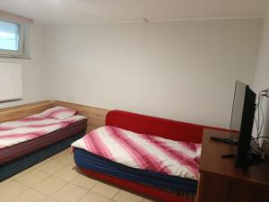 Gambar di galeri bagi Fenix Grzybno pokoje pracownicze, rodzinne, typu standard,dłuższe pobyty di Grzybno