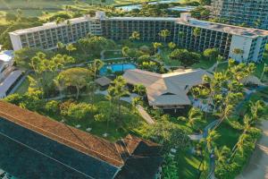 an aerial view of a resort with palm trees and buildings at OUTRIGGER Kāʻanapali Beach Resort in Lahaina