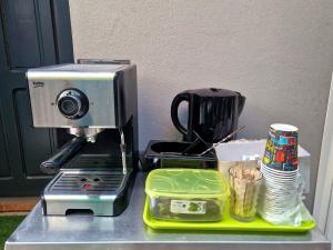 a coffee maker sitting on top of a counter at Vila Andora in Eforie Nord