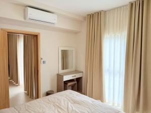 Postel nebo postele na pokoji v ubytování Minissy luxury Serviced Apartment