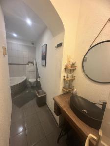 a bathroom with a sink and a toilet and a mirror at Mea Mali Lošinj in Mali Lošinj +14 photos