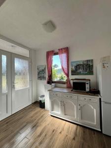 Η κουζίνα ή μικρή κουζίνα στο Rooms Danica
