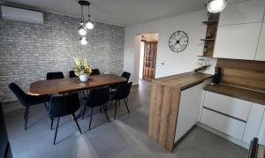Kuchyň nebo kuchyňský kout v ubytování Apartman Kristina + 33 fotografií