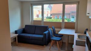 Χώρος καθιστικού στο Haus am Wäldchen Wohnung 3