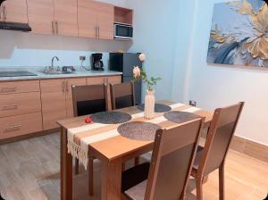 Η κουζίνα ή μικρή κουζίνα στο Departamento con terraza y asador