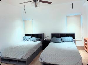 Ένα ή περισσότερα κρεβάτια σε δωμάτιο στο Departamento con terraza y asador