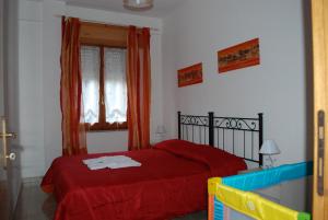 Letto o letti in una camera di Apartment Conchiglie