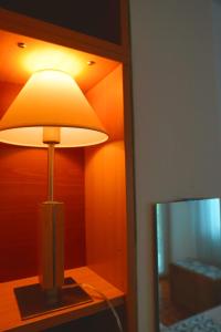 Postel nebo postele na pokoji v ubytování Nomada Apartment