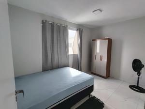 Ένα ή περισσότερα κρεβάτια σε δωμάτιο στο Solar das árvores