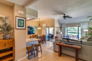 a living room with a kitchen and a dining room at Kapalua Golf Villas 15P3-4 in Kapalua