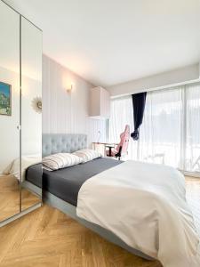 Katil atau katil-katil dalam bilik di Appartement Avec Piscine Métro Convention
