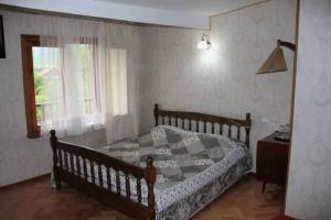 Postel nebo postele na pokoji v ubytování Hotel Queen