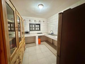 Kuchyň nebo kuchyňský kout v ubytování Bien-être + 10 fotografií