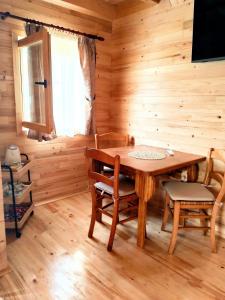 TV o dispositivi per l'intrattenimento presso Magical Log House