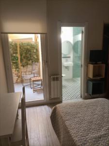 Posteľ alebo postele v izbe v ubytovaní Hostal Quiper