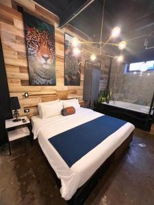 Ένα ή περισσότερα κρεβάτια σε δωμάτιο στο Stylish Stay near Lleras Park