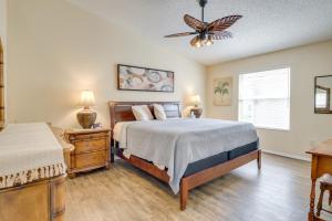 a bedroom with a bed and a dresser and a window at 4 Mi to Lake Sumter Landing Home in The Villages in The Villages +29 photos