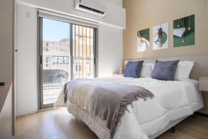 Postel nebo postele na pokoji v ubytování Pivo Match Jardins + 39 fotografií