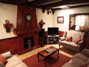 Ο χώρος του lounge ή του μπαρ στο Tudor Lodge Guest House