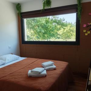 Giường trong phòng chung tại Alojamento 444 +21 ảnh