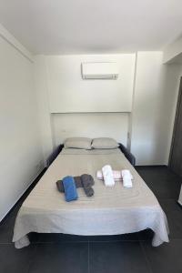 Кровать или кровати в номере Soulmondo Beach Apartments