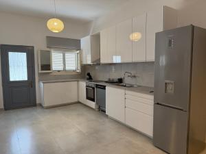 Η κουζίνα ή μικρή κουζίνα στο Casa Ilia Spetses