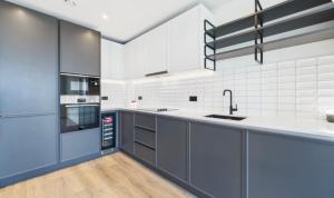 Kuchyň nebo kuchyňský kout v ubytování Modern Flat - 10 mins from O2 Arena