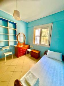 Ένα ή περισσότερα κρεβάτια σε δωμάτιο στο SMEMS-PAPPAs