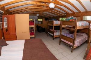 Postel nebo postele na pokoji v ubytování Habitaciones y Apartamentos el Caleuche El Tabo