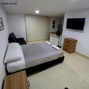 Una cama o camas en una habitación de Casa Los Alpes