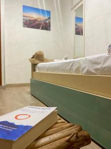 Postel nebo postele na pokoji v ubytování La casetta nel centro storico di Cefalù