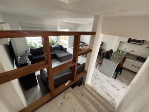 an overhead view of a living room and a kitchen at Casa a Pie de Playa in Acapulco