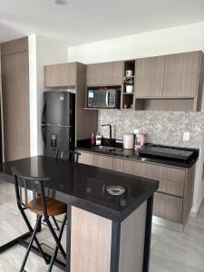 Kuchyň nebo kuchyňský kout v ubytování CC Condominio