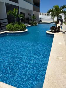 Bazén v ubytování CC Condominio nebo v jeho okolí