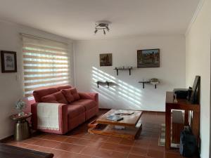 Posezení v ubytování El Solar Hostel - Comuna 13, graffitour