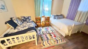 Ένα ή περισσότερα κρεβάτια σε δωμάτιο στο 5BR Home Close to Stateline, Beaches & Shopping
