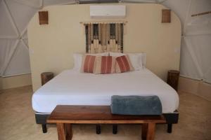 Postel nebo postele na pokoji v ubytování Glamping Mayan Glam