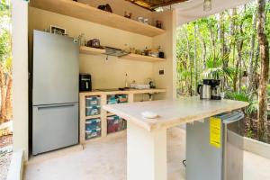 Kuchyň nebo kuchyňský kout v ubytování Glamping Mayan Glam