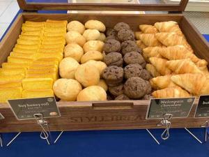 a display of different types of pastries and muffins at Toyoko Inn Yashio Ekimae in Yashio