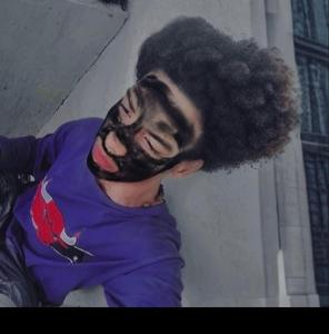 a man with a beard on his face at Yeiko in Carlos Guerra