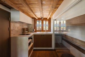 a kitchen with a sink and a counter top at Luxury Hanok Sangseon Heritage Hanok-W in Cheongju