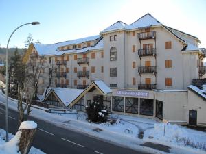 Budova, kde se apartmán nachází + 5 fotografií