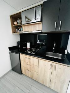 Kuchyň nebo kuchyňský kout v ubytování Loft central, confortable y turístico