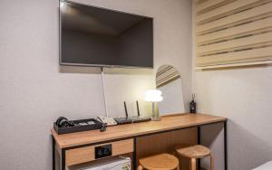 Kuchyň nebo kuchyňský kout v ubytování Peanut Hotel Myeongdong