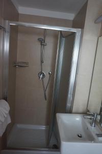 Koupelna v ubytování Hotel Aurora