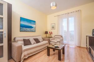 A seating area at Vera Apartment with Seaview