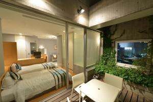 Tempat tidur dalam kamar di Hotel Flex