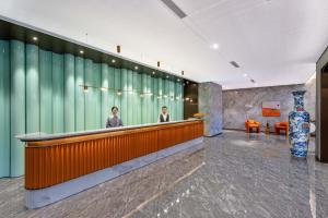 Επισκέπτες που μένουν στο Orange Hotel Beijing Jiugong