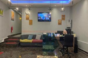 TV a/nebo společenská místnost v ubytování Hotel Dlima Inn Bukit Bintang